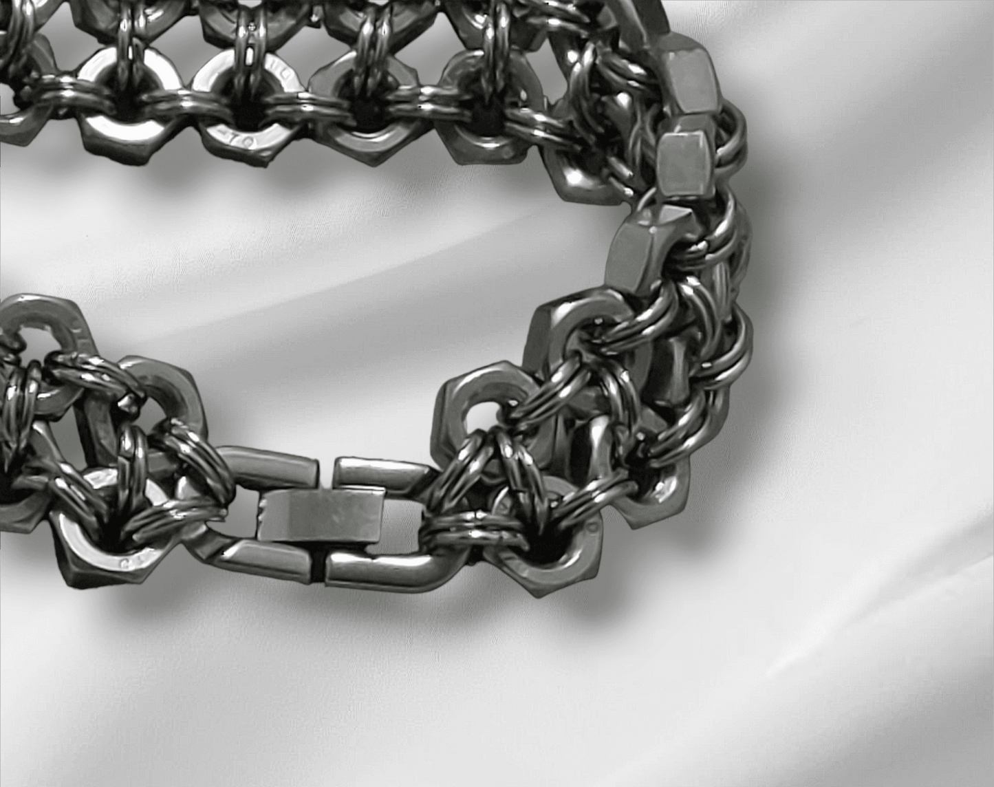 Nutz n Chains metal cuff cuff bracelet with intricate chain links and a secure clasp