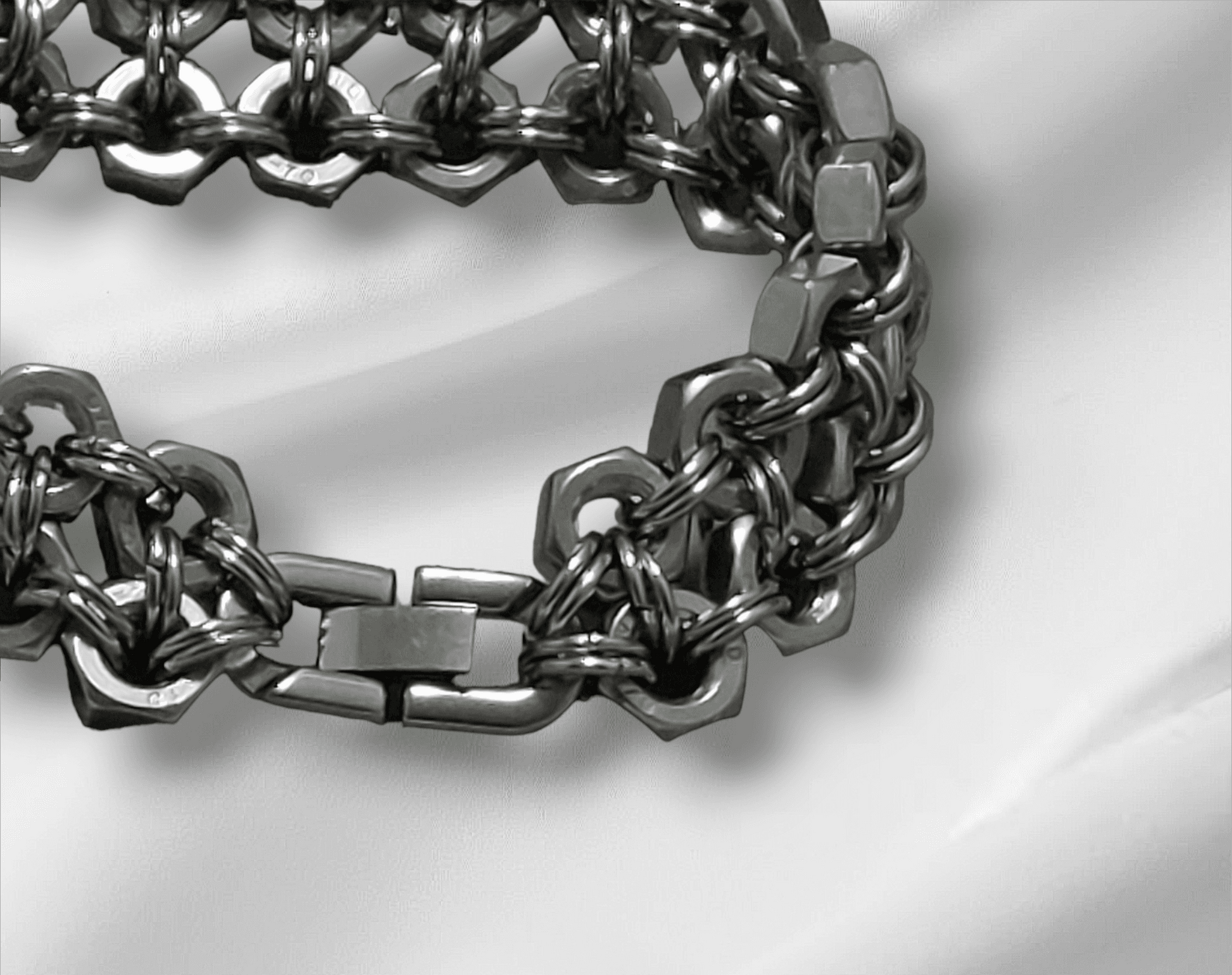 Nutz n Chains metal cuff cuff bracelet with intricate chain links and a secure clasp