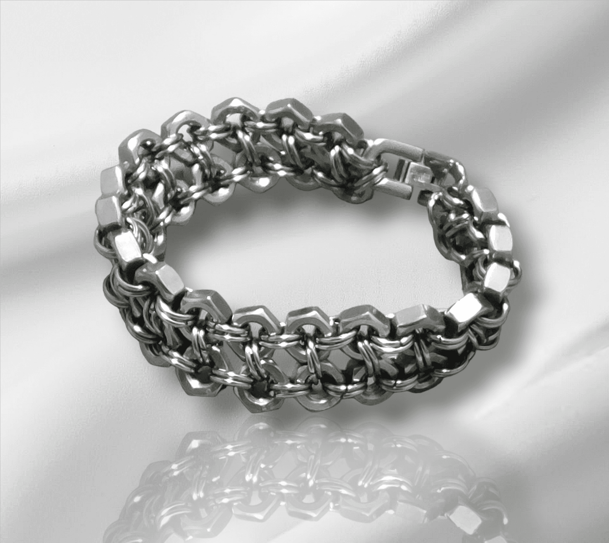 Nutz n Chains silver metal cuff cuff bracelet with hexagonal links and chain design