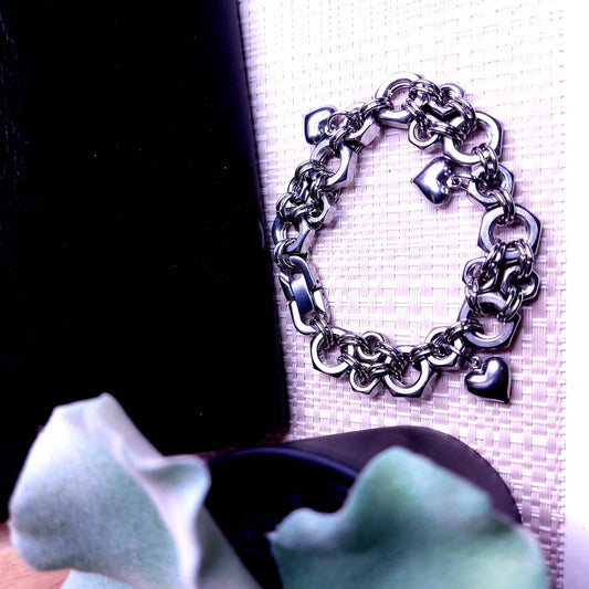 Silver chain bracelet with heart charms displayed as pandora charm bracelet charms by Nutz n Chains